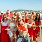 group having fun all dressed in red outfits